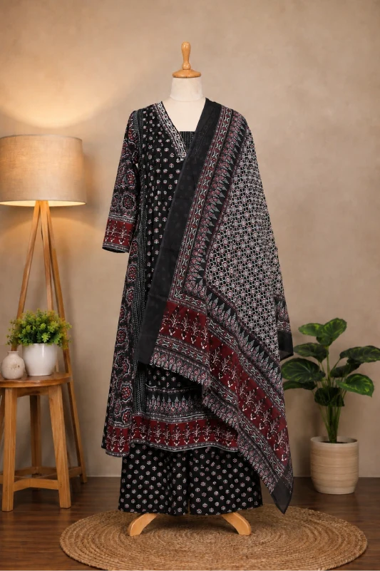 Shop an Ajrakh printed kurta set for women at Subi Trends, featuring a black and maroon Anarkali kurta, matching bottom and printed dupatta for elegant ethnic occasions.