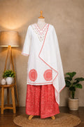 Shop the White & Coral Red Embroidered Kurta Palazzo Set by Subi Trends, crafted in pure cotton with elegant detailing for effortless ethnic style.