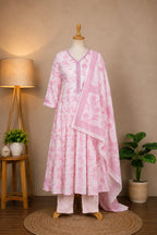 Shop the light pink floral anarkali suit set for women by Subi Trends, crafted in comfortable cotton with a flowy kurta, matching pants and floral printed dupatta.